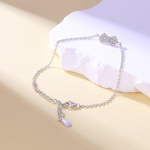 Gleamique - Pulsera con motivo de lazo de moissanita y cadena ajustable