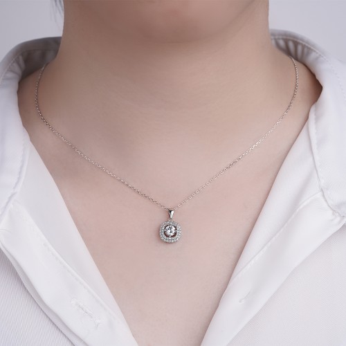 Vivara - Colgante de moissanita con halo de piedras engastadas